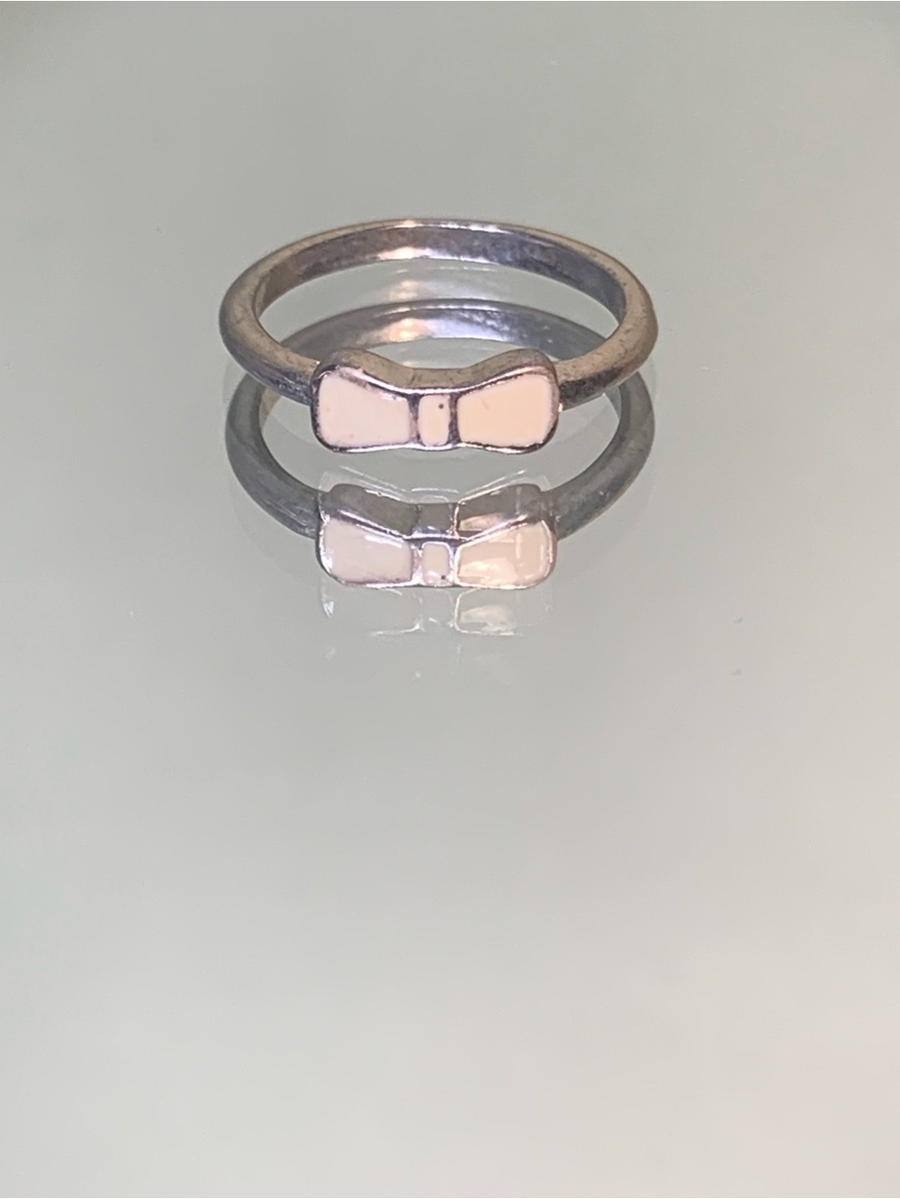 Silver-tone Bow Ring with White Enamel Accent
